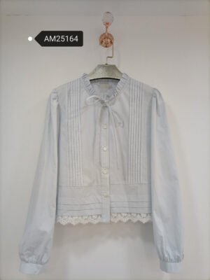 Pintucked Ruffle Blouse with Lace Hem – Fine pintucks and scalloped lace hem | XM Fashion Mfg