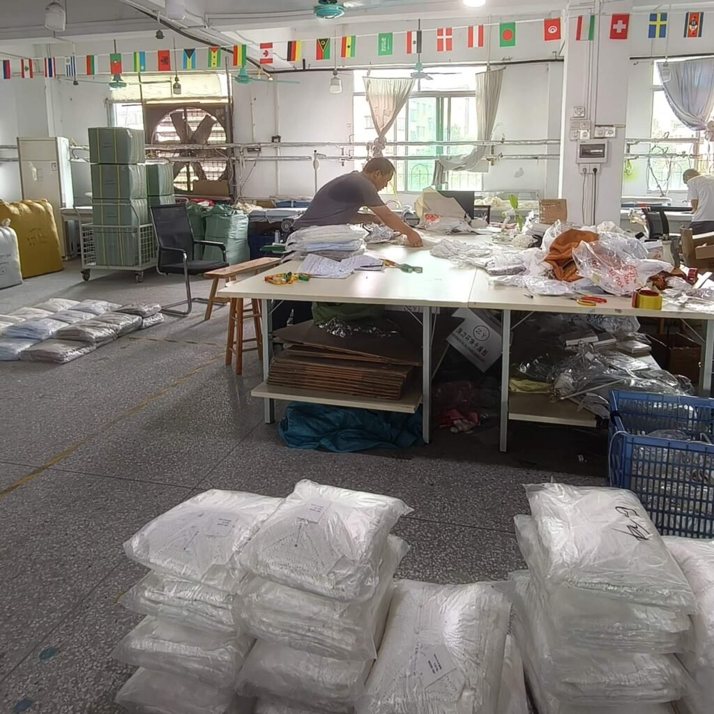 Take a look inside our production floor. We manage the entire process to maintain the highest standards for your boutique. Our own pattern room, cutting and finishing in Guangzhou — every order is strictly checked by our QC team before it ships worldwide. From raw fabric to beautifully packaged garments, we ensure transparency and quality at every step.