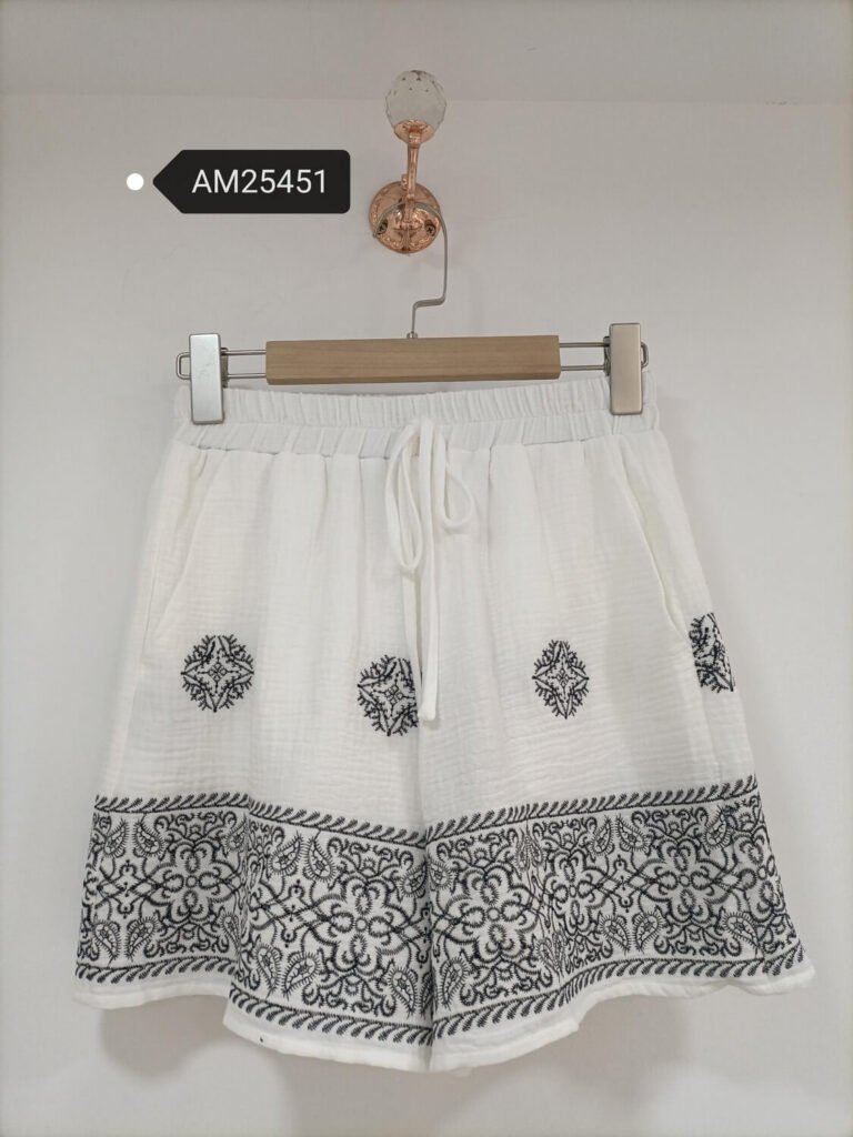 Ornamental Border Tank and Shorts Set in off-white with black motifs. Detailed front flat lay view highlighting the overall silhouette. B2B wholesale Matching Sets SKU: AM25451.