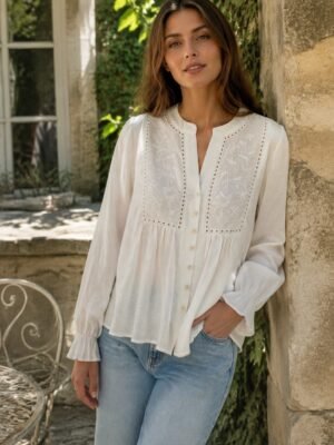 White Floral Panel Gathered Blouse in white. Lifestyle model shot showcasing the fit and drape. B2B wholesale Blouses & Tops SKU: AM25375.