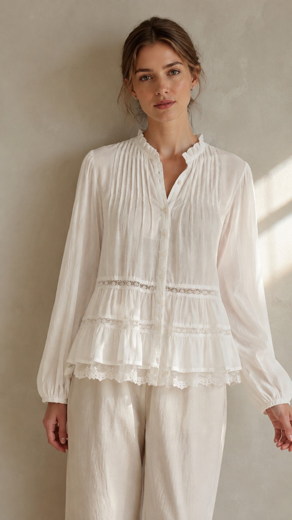 White Tiered Ruffle Collar Blouse in white. Lifestyle model shot showcasing the fit and drape. B2B wholesale Blouses & Tops SKU: AM261086.